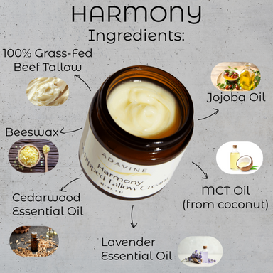 Jar of ADAVINE Harmony Whipped Tallow Cream with labeled ingredients on a gray background